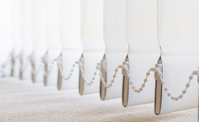 Vertical blinds covering a wide opening
