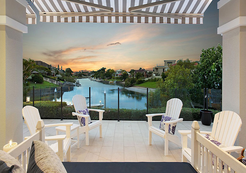 Folding-arm retractable awning installed by Gold Coast Blinds and Shutters