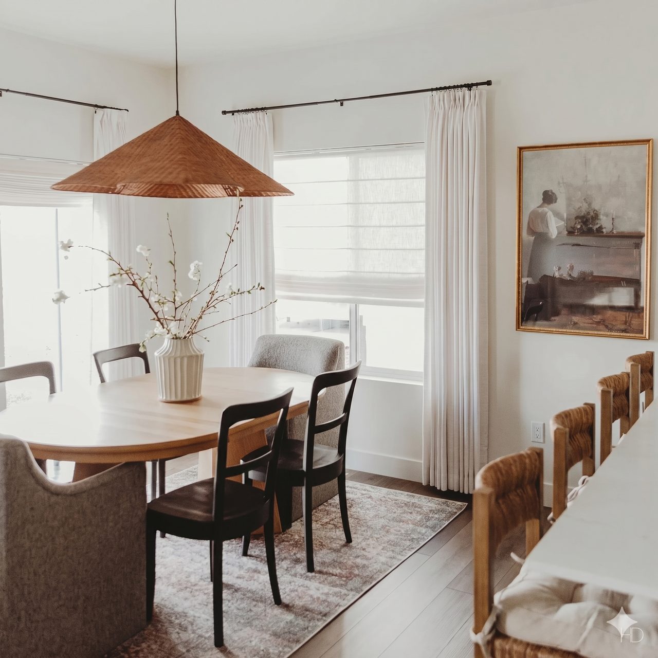 Dining room with pinch-pleat sheer curtains by Gold Coast Blinds and Shutters