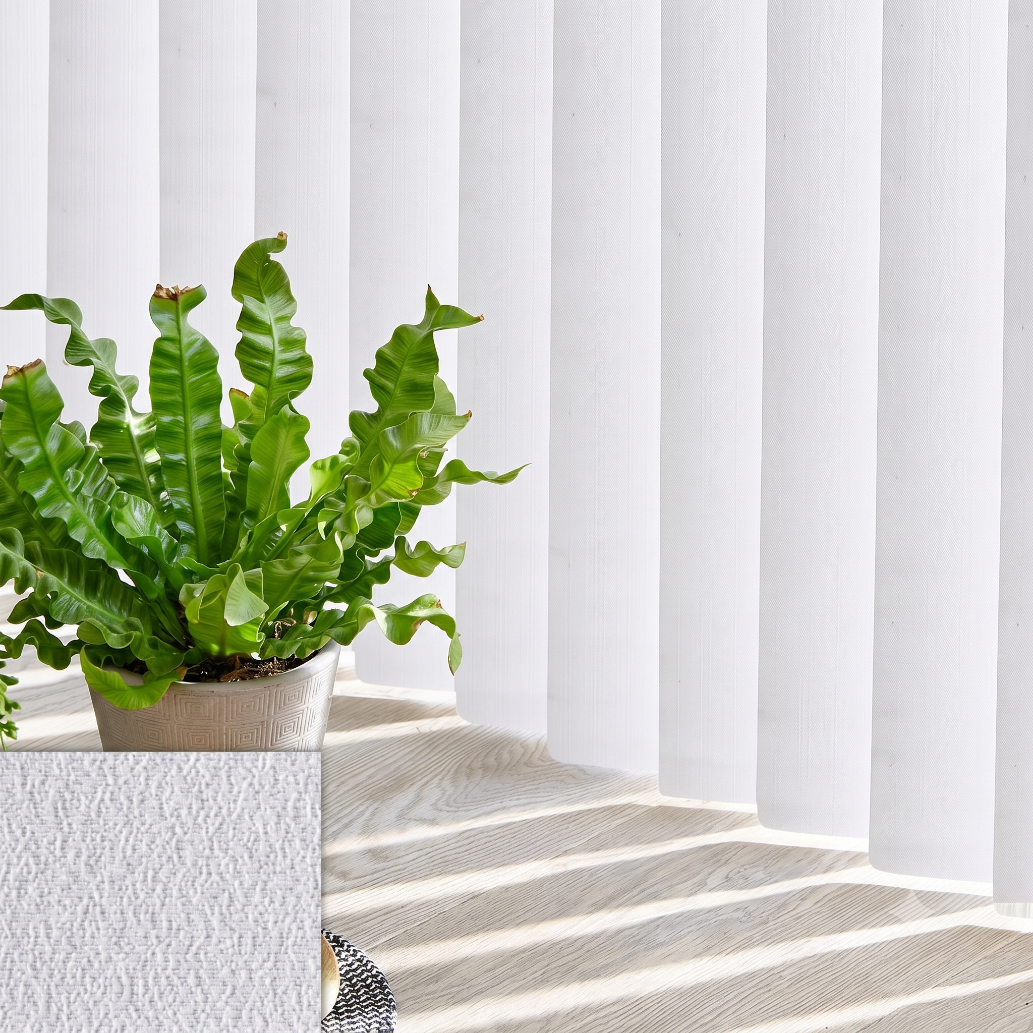 Vertical blinds drawn across a wide living room window
